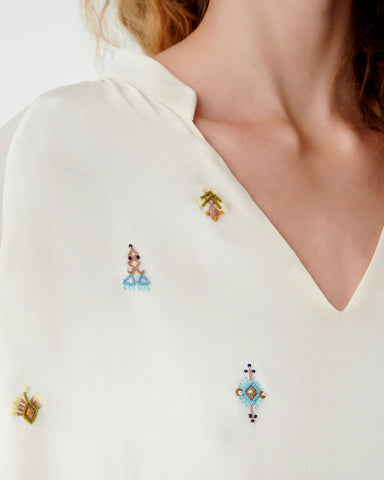 Ilizia Bluse mit handbestickten Motive